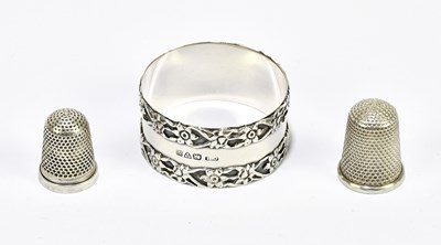 Lot 2516 - CHARLES HORNER; a hallmarked silver napkin...