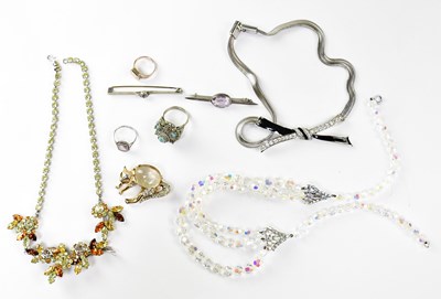 Lot 849 - A collection of costume jewellery to include a...