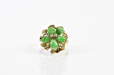 Lot 137 - A 14ct yellow gold jade and diamond flowerhead...