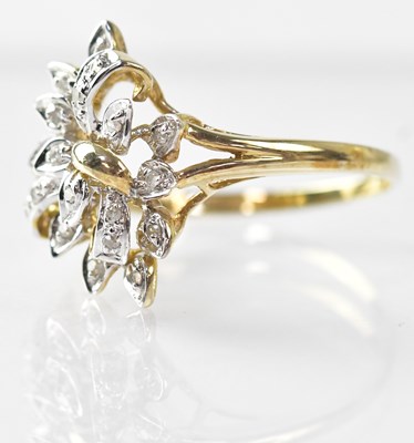 Lot 734 - A 9ct gold ring set with small diamonds in...