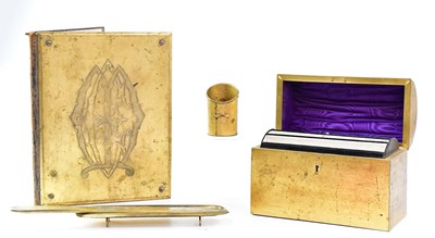 Lot 246 - A Victorian gilt metal desk companion set with...