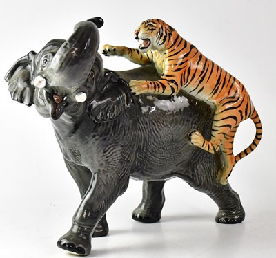 Lot 357 - BESWICK; a large figure group of an elephant...