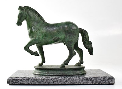 Lot 179 - A bronze figure of a horse, on an oval stepped...