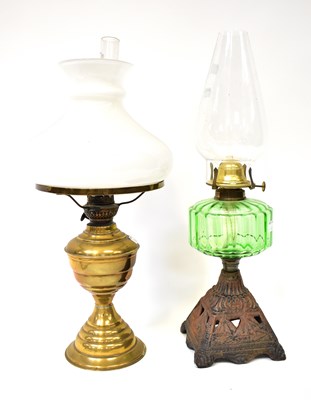 Lot 119 - Two vintage oil lamps, comprising a cast metal...