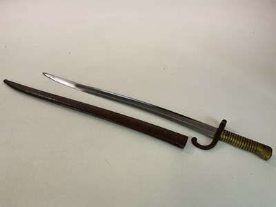 Lot 19 - A French M 1866 chassepot bayonet, with brass...