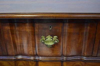 Lot 30 - A Georgian-style side table with three carved...