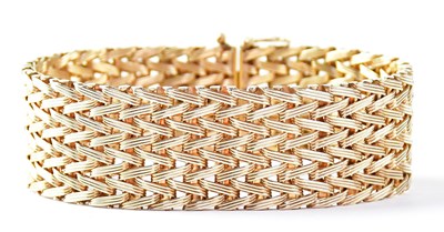 Lot 747 - A 9ct gold articulated bracelet of woven...