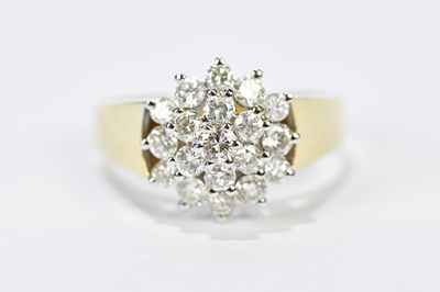 Lot 106 - An 18ct yellow gold diamond floral cluster...