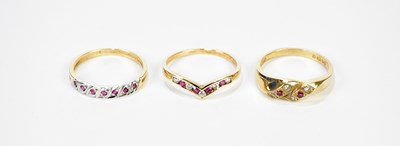 Lot 152 - Three 9ct yellow gold ruby and diamond dress...