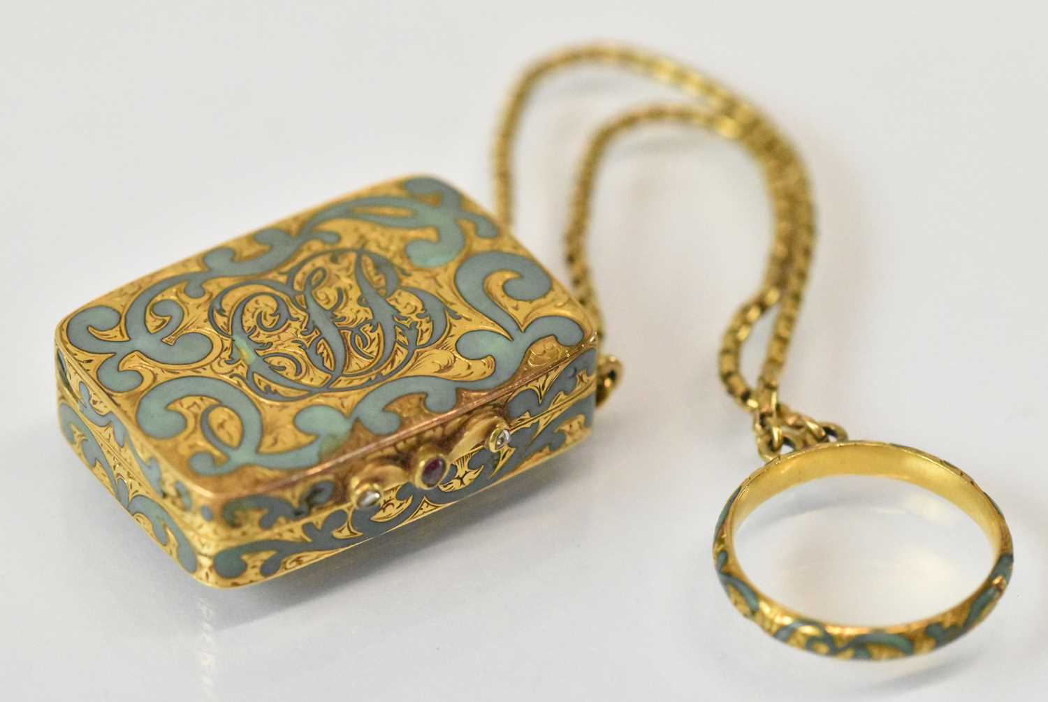 Lot 1354 - A yellow metal and turquoise enamel...