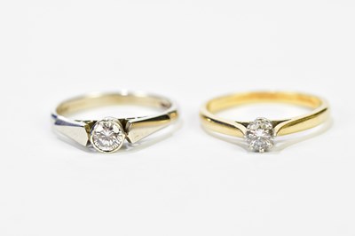 Lot 176 - Two 9ct yellow gold diamond solitaire rings,...