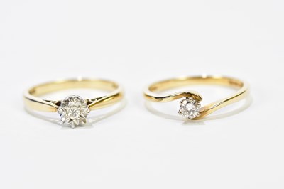 Lot 224 - Two 9ct yellow gold diamond solitaire rings,...