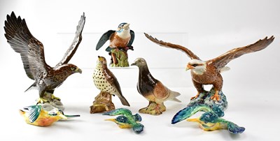 Lot 352 - BESWICK; a collection of ceramic birds to...