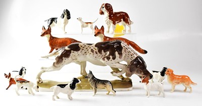 Lot 372 - A quantity of Beswick and other ceramic dogs...