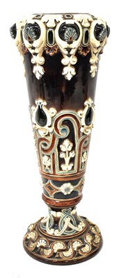 Lot 319 - A Majolica vase of tapering form to spreading...