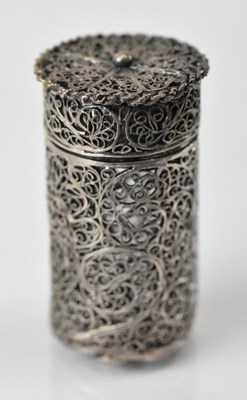 Lot 1317 - A Continental white metal filigree cylindrical...