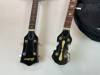 Lot 177 - An Antonia four string banjo and a German five...