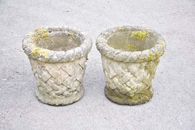 Lot 462 - A pair of reconstitued stone planters with...