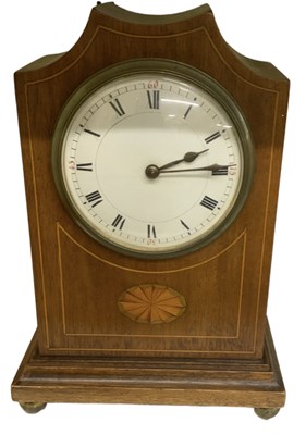 Lot 144 - An Edwardian mahogany and inlaid mantel clock,...