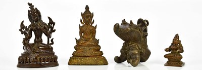 Lot 1296 - A 19th century Sino Tibetan model of Buddha,...