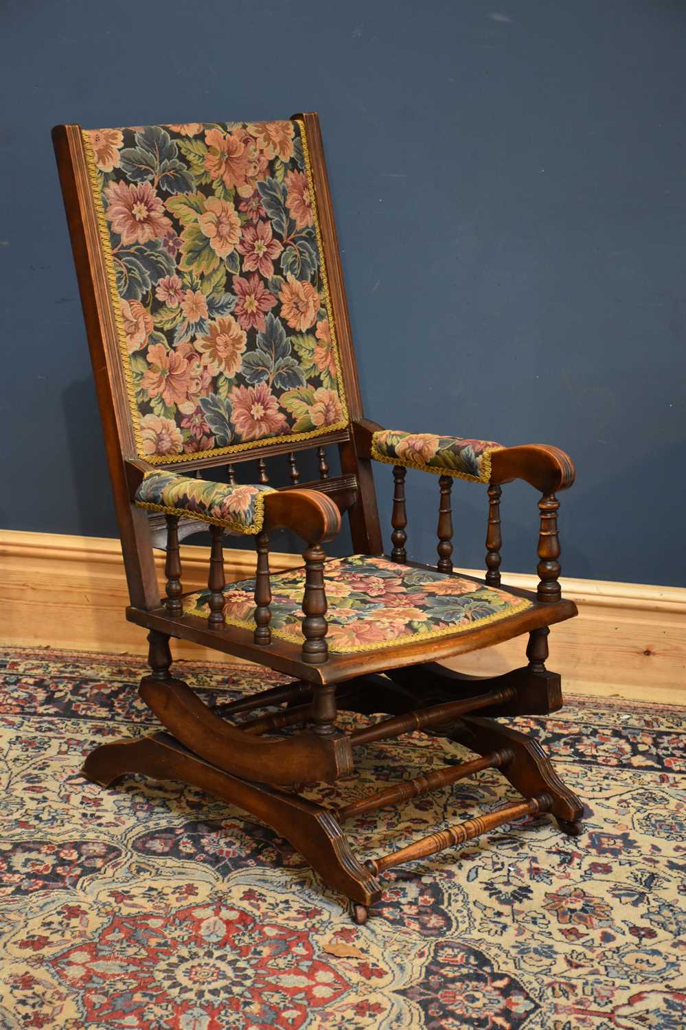 Lot 1082 - A late Victorian American style rocking