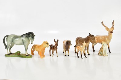 Lot 1543 - BESWICK; a collection of figures to include...