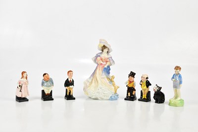 Lot 1529 - ROYAL DOULTON; a small collection of figures...