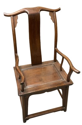 Lot 1005 - A large Chinese hardwood yoke back elbow chair,...