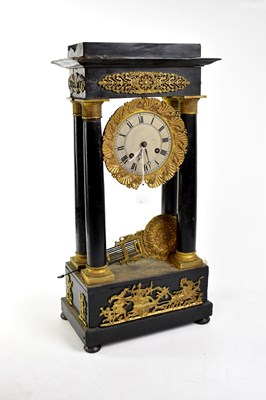 Lot 64 - A Victorian ebonised and gilt metal mounted mantel clock