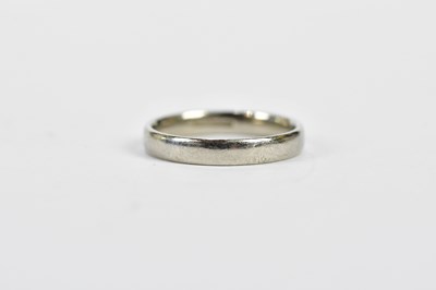 Lot 233 - A platinum wedding band, size L, approx. 2.25g.