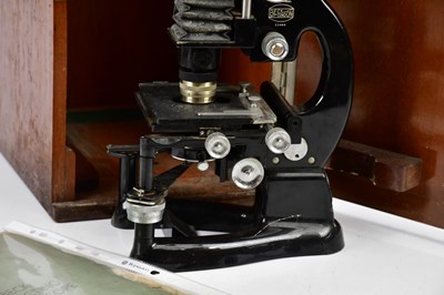 Lot 714 - BECK, LONDON; a model 4196 cased microscope,...