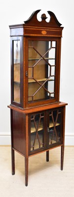 Lot 90 - An Edwardian inlaid mahogany display cabinet,...