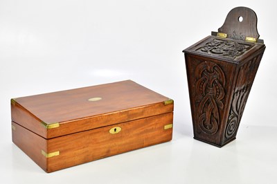 Lot 498 - A 19th century carved oak candle box, height...