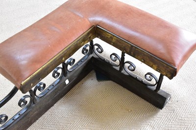 Lot 775 - A wrought iron club fender with scrolling...