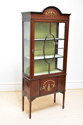 Lot 92 - An Edwardian inlaid mahogany display cabinet...
