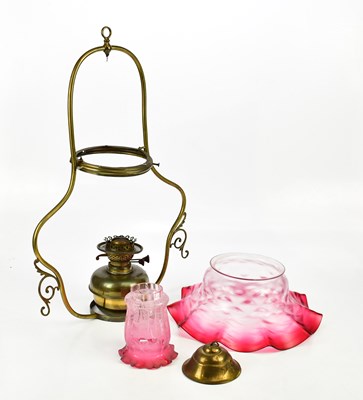 Lot 818 - A Victorian brass hanging oil lamp, with large...