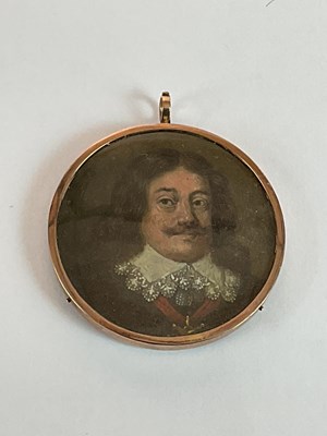 Lot 183 - A circular portrait miniature, possibly 17th...