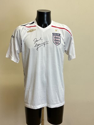 Lot 185 - PAUL GASCOIGNE; a replica England shirt signed...