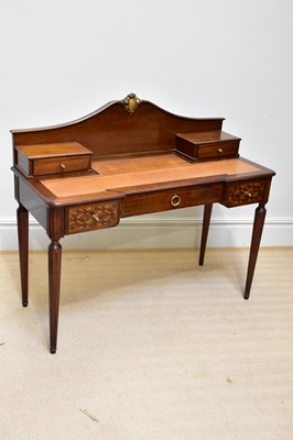 Lot 237 - A reproduction French style writing table with...