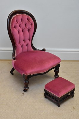 Lot 130 - A Victorian nursing chair with button back...