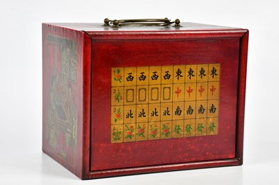 Lot 1255 - A modern Mahjong set in a red lacquered effect...