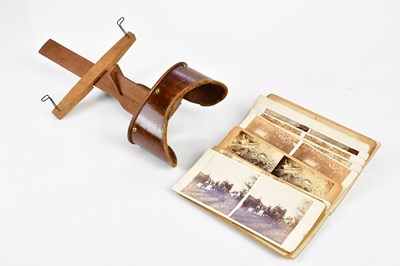 Lot 688 - A vintage stereoscopic viewer and slides...