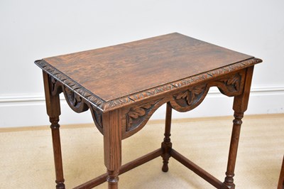 Lot 46 - A 1920s carved oak side table on turned...