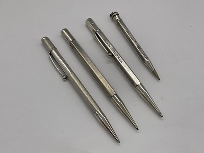 Lot 107 - Four sterling silver pencils.