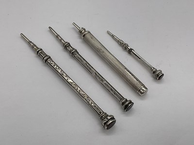 Lot 110 - Four silver propelling pencils.