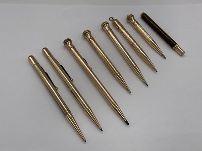 Lot 113 - Eight gold plated pencils comprising three...