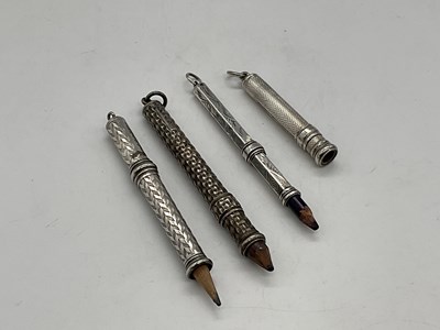 Lot 116 - Four silver Port De Crayon pencils.