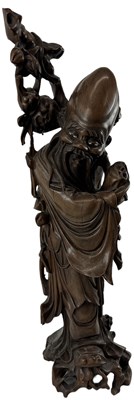 Lot 1131 - A large Chinese rootwood figure of Shou Lao,...