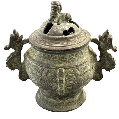 Lot 1111 - A Chinese archaic style lidded bronze censer,...