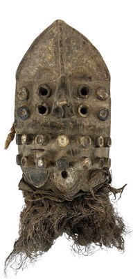 Lot 1088 - A Grebo carved wooden twenty eye mask, height...